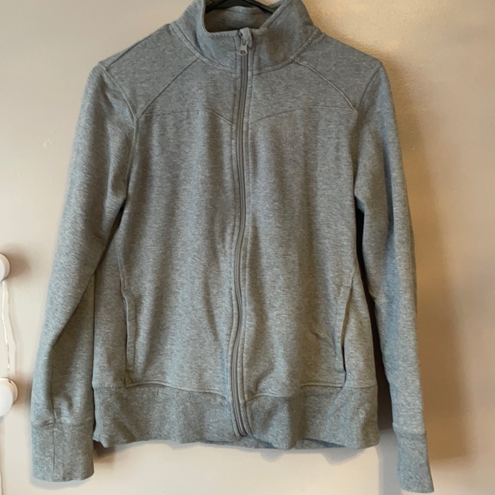 dark grey colored zip up